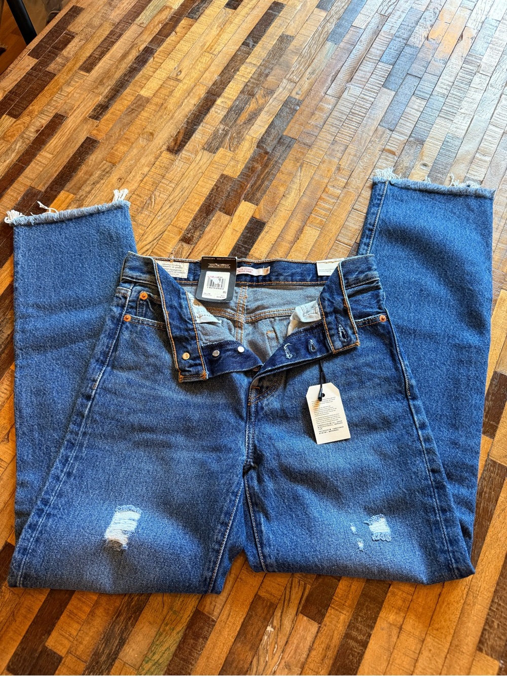 Levi's Blue Distressed Boyfriend Jeans with Frayed Hems